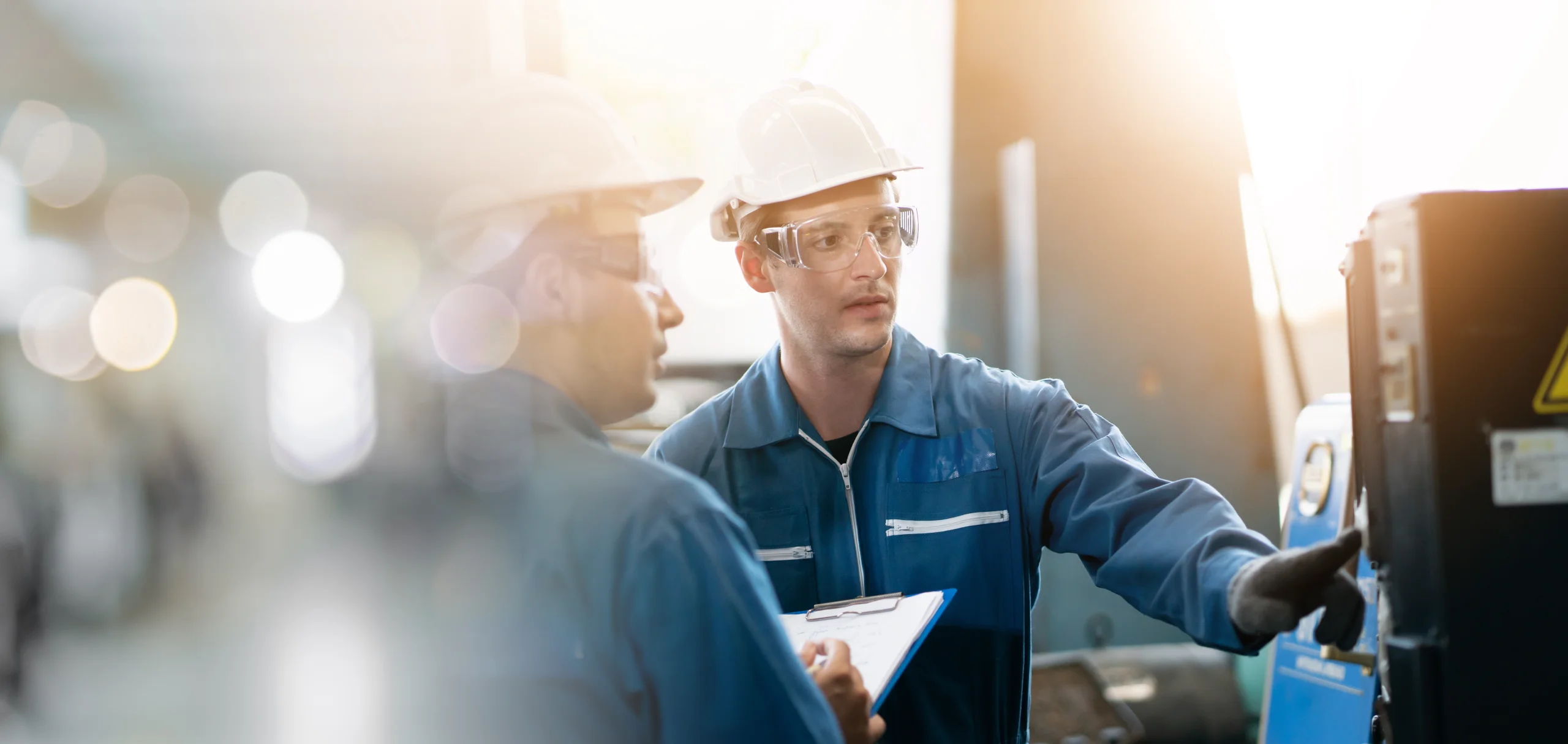 Skilled Trade Workers Talking On Site
